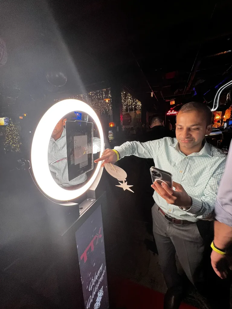 guests receiving photo from photo booth via text