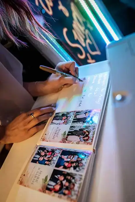 guests signing the wedding guest book